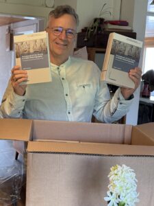 Upacking the box of copies of my book